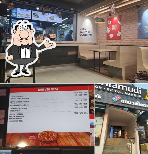 Take a seat at one of the tables at Domino's Pizza Kulathoor, Thiruvananthapuram