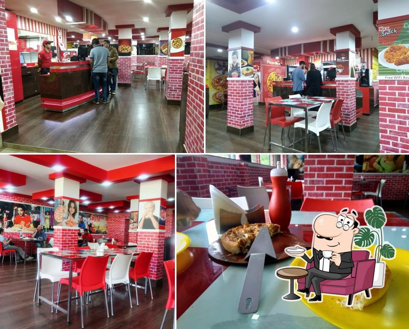 The interior of Pizza Max