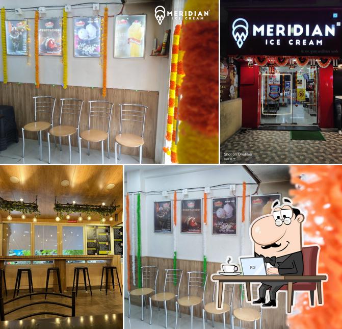 Take a seat at one of the tables at Meridian Ice Creams Sasanenagar Hadapsar