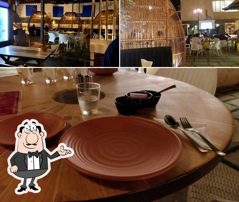 Take a seat at one of the tables at Chulha Village
