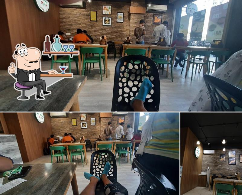 Take a seat at one of the tables at La Pino'z Pizza