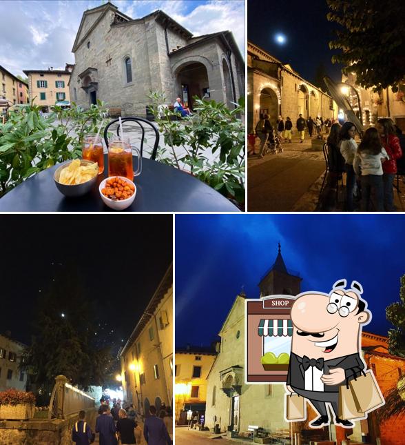 Puoi goderti l'aria fresca da seduto all'esterno di Bar de piazza