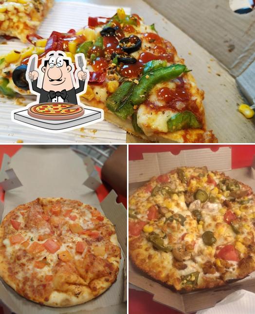 At Domino's Pizza Doaba College Chowk, Jalandhar, you can enjoy pizza