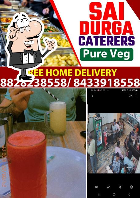 The photo of interior and beverage at Hotel Sai Durga - Pure Veg