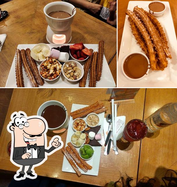 Take a seat at one of the tables at Chocolateria San Churro