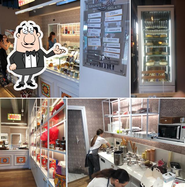 Siediti a un tavolo di AMMU Cannoli Espressi Siciliani