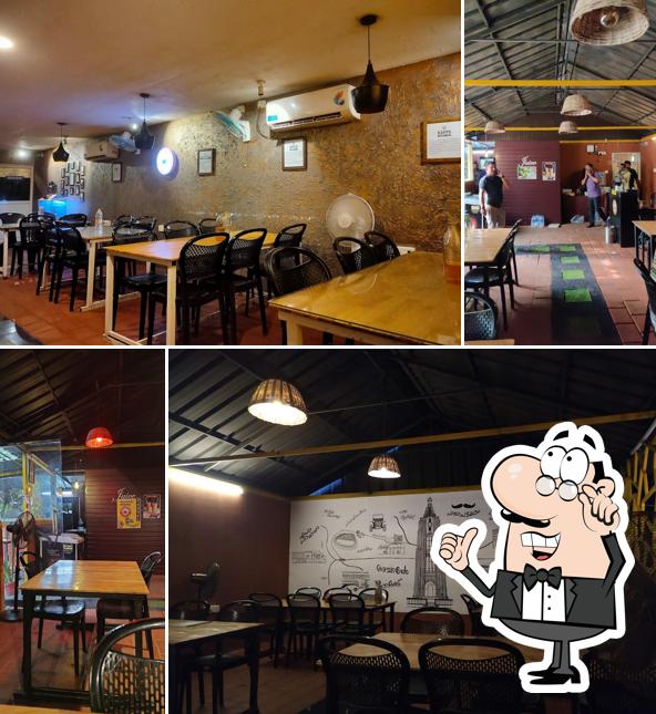 Take a seat at one of the tables at Achayante Adukkala