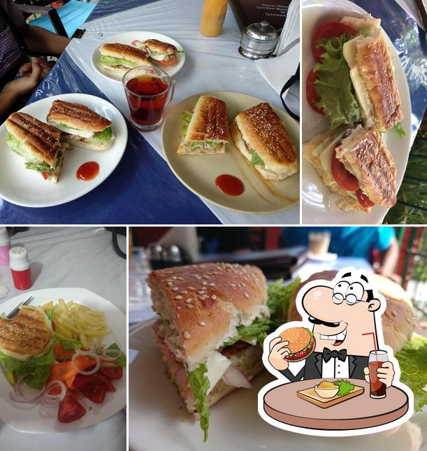 Try out a burger at River Music Garden Restaurant & German Bakery