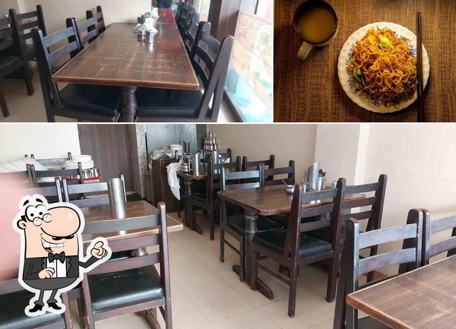 The picture of interior and food at Ganesh Restaurant