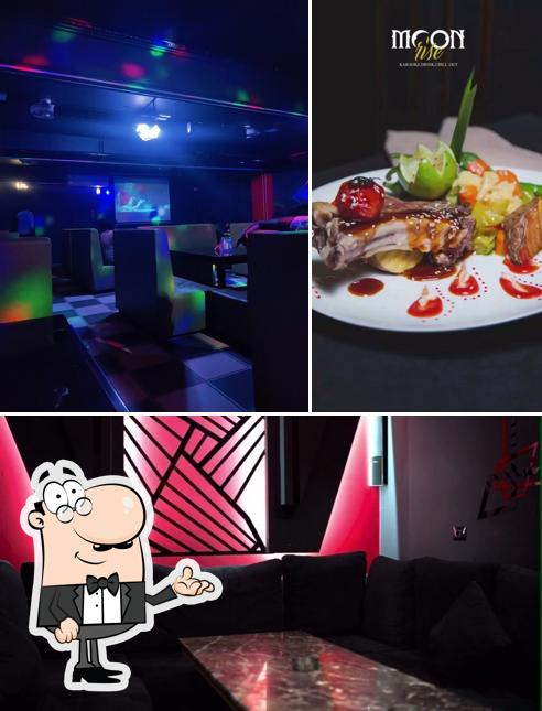 Take a seat at one of the tables at Moon Rise Bar