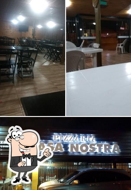 O interior do Pizzaria Casa Nostra