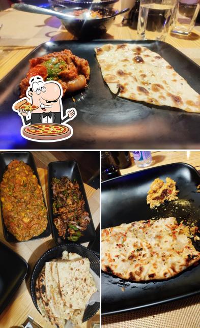 Order pizza at Garnish Cafe - A Multicuisine Family Restaurant