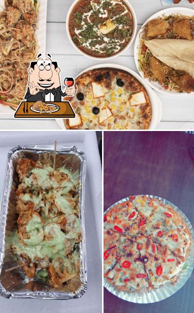 Get pizza at Rawat food Point