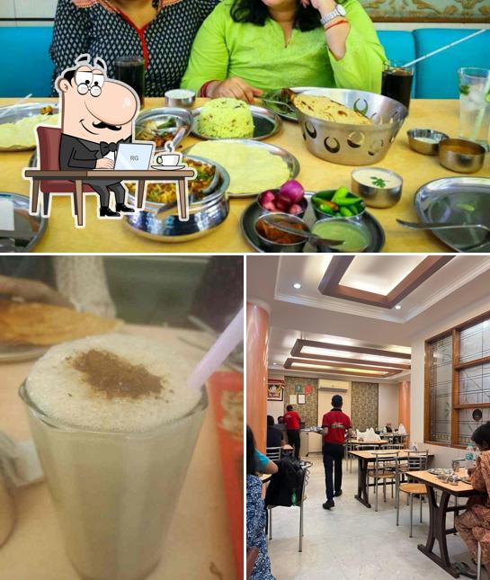 The photo of interior and beverage at Sagar Ratna