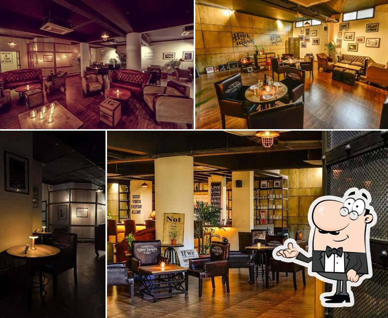 Take a seat at one of the tables at Hook & Irons Bar
