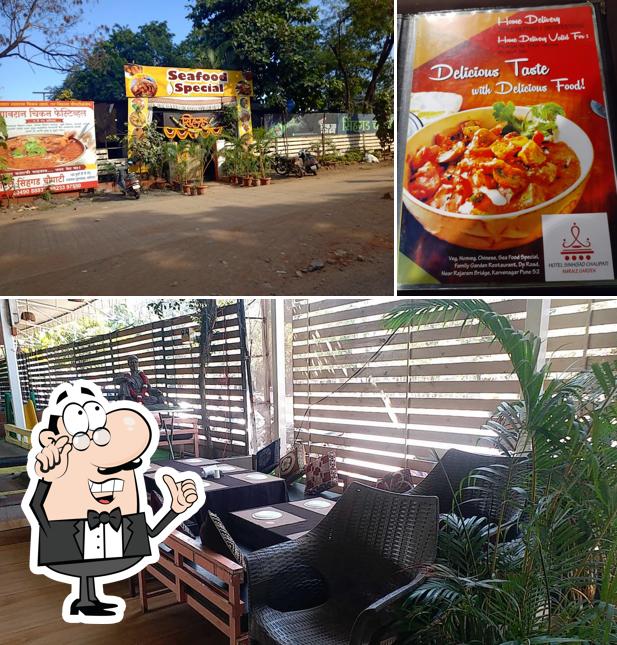 Take a seat at one of the tables at Sinhagad Chaupati
