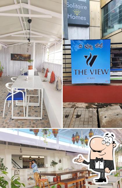 Take a seat at one of the tables at The View Cafe and Restaurent