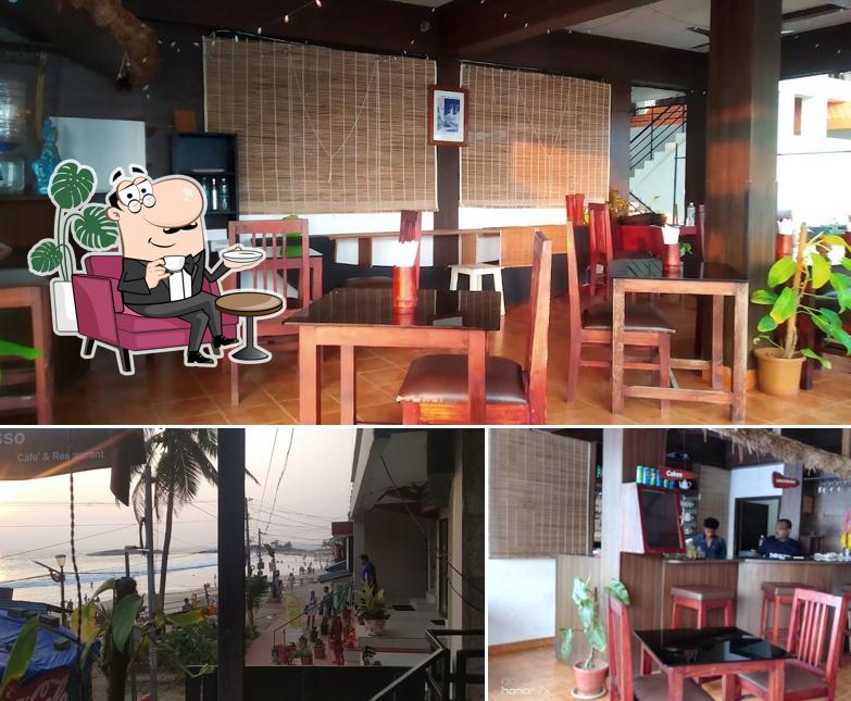 Take a seat at one of the tables at Impresso Cafe