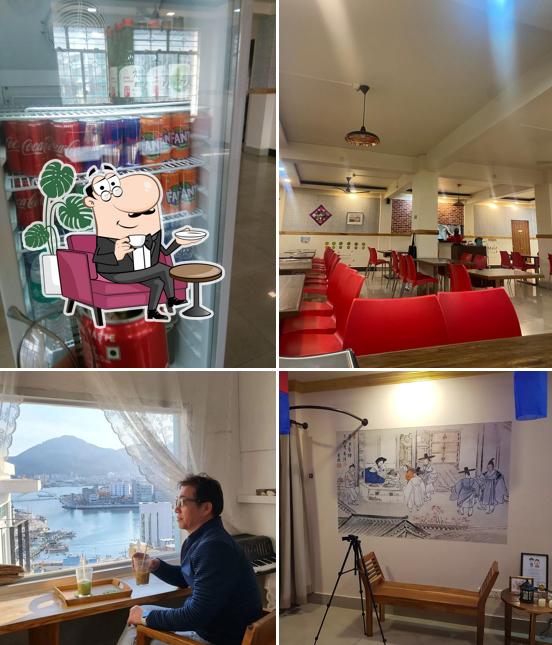 Take a seat at one of the tables at Korean Uncles Cafe