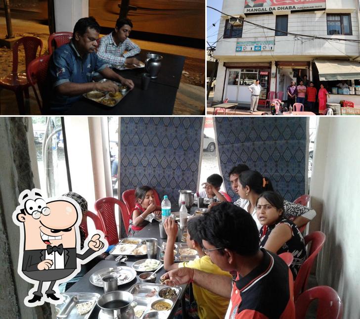 Take a seat at one of the tables at Mangal Da Dhaba