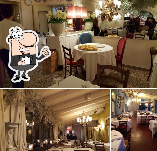 Siediti a un tavolo di Antica Trattoria La Grotta