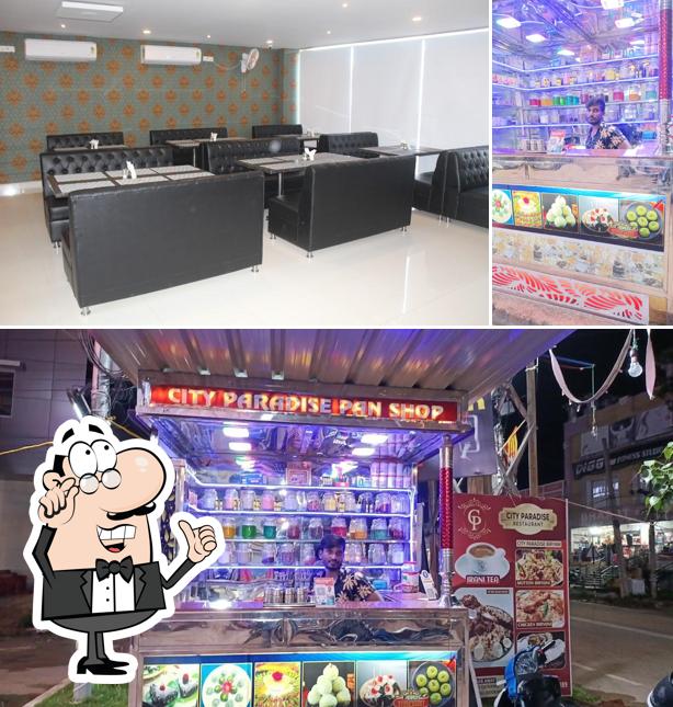 Take a seat at one of the tables at City Paradise Restaurant