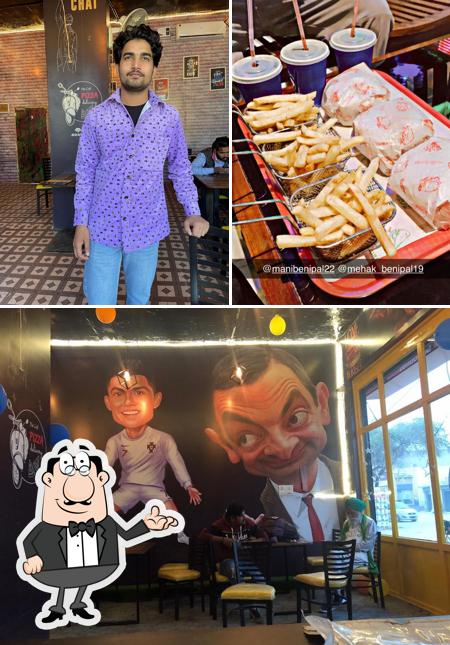 Take a look at the photo depicting interior and food at The Cafe (One and Only)