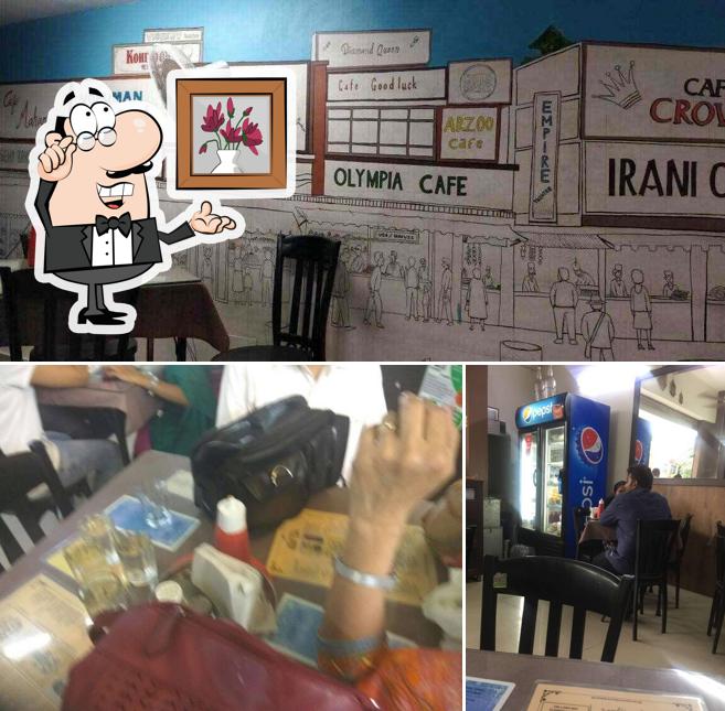 Take a seat at one of the tables at Irani Cafe