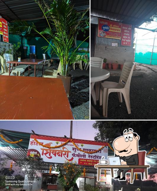 Take a seat at one of the tables at Shivneri Dhaba