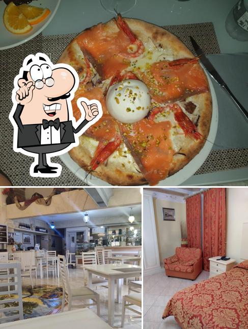 La immagine della interni e cibo di Hotel Centrale