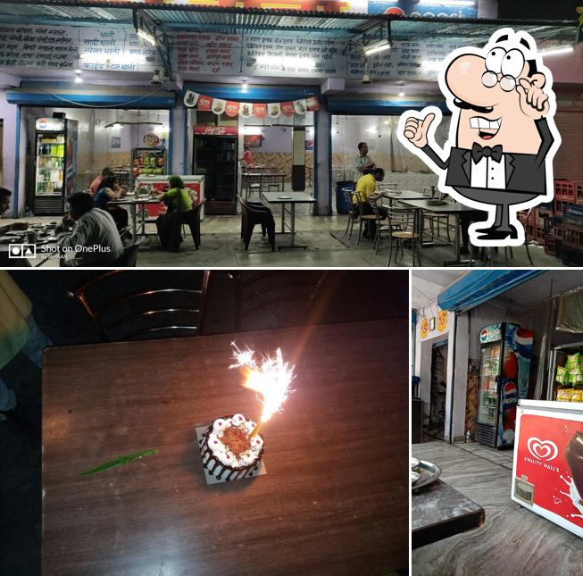 Check out the image depicting interior and cake at Five Star Dhaba