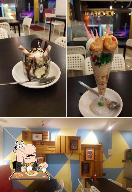 Among different things one can find food and interior at Trivarna - Pure Veg Restaurant