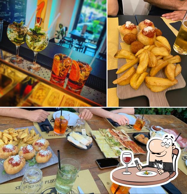 La foto di cibo e alcol da Striscia la Pizza