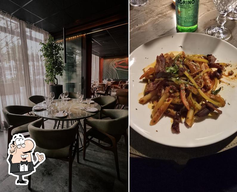 Sente em uma das mesas no Trevi Cucina