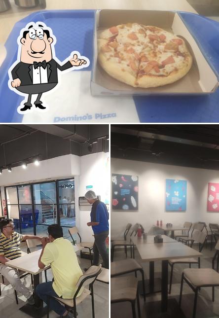 Among various things one can find interior and food at Domino's Pizza Dangra Toli Chowk, Ranchi