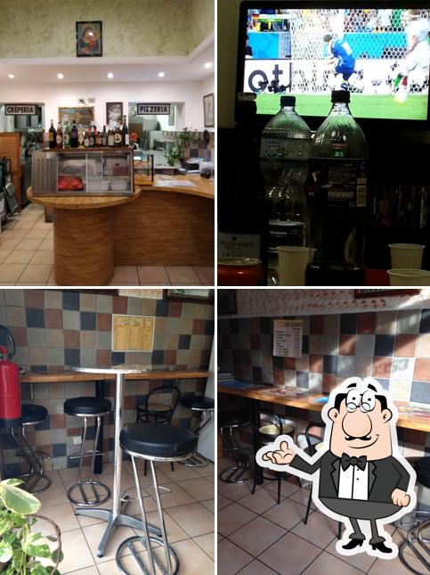 Siediti a un tavolo di Pizzeria La Roccia