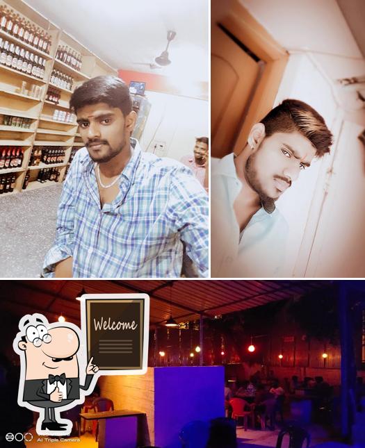 Look at the image of Nisarga Bar and Restaurant