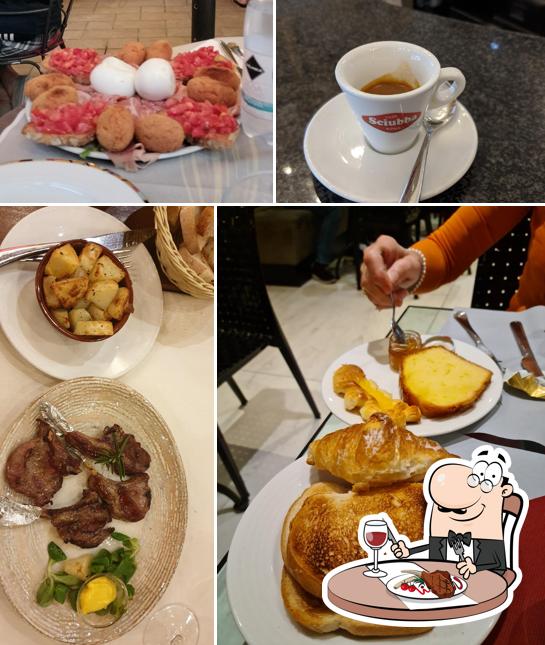 Prenditi i piatti di carne a Ludovisi Palace Hotel