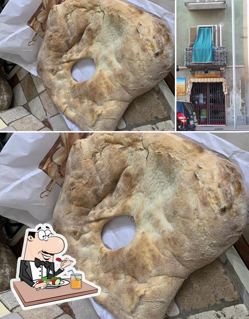 Questa è la immagine che presenta la cibo e interni di Panificio Il Santo Pane Di Cinanni Lorena