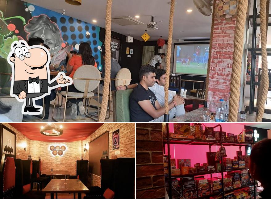 Take a seat at one of the tables at akshatha kadaba