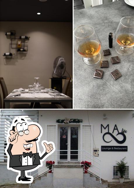 Dai un'occhiata agli interni di Ma Life Lounge e Restaurant