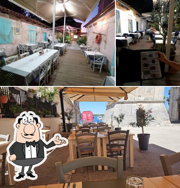 Dai un'occhiata agli interni di Coco Pizzeria