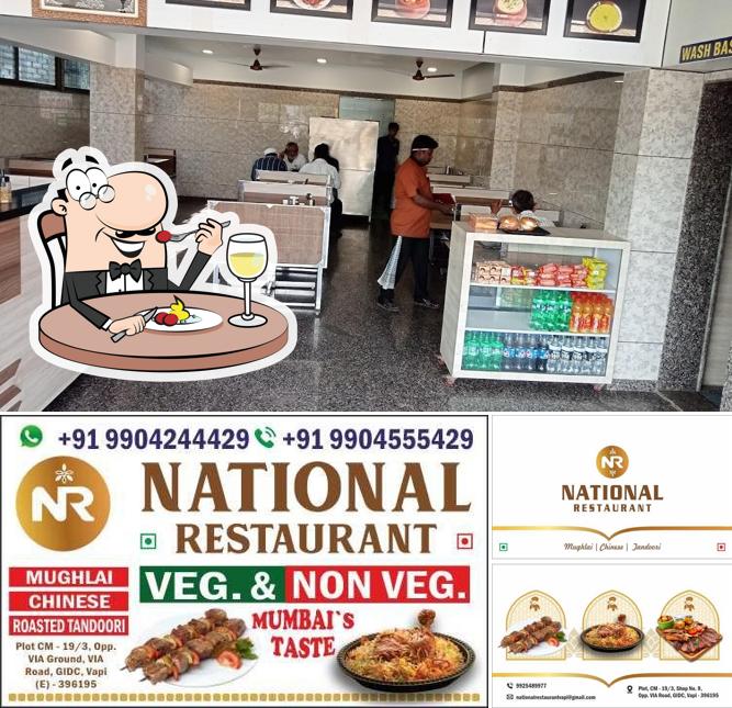 This is the photo displaying food and interior at National Restaurant Vapi