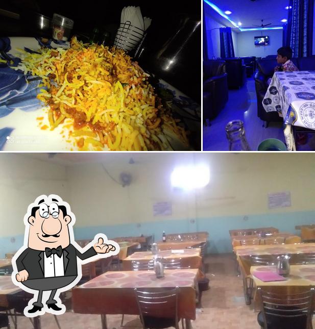 This is the photo displaying interior and food at Abhiram Bar And Restaurant
