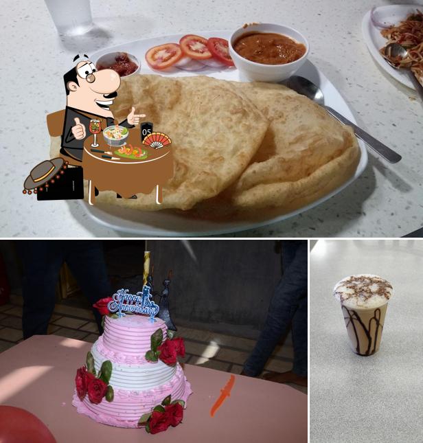 Among various things one can find food and drink at Vardhman Restaurant