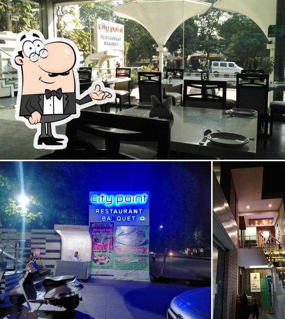 Take a seat at one of the tables at City Point Restaurant & Banquet - Best Restaurant in Anand Best Banquets Hall in Anand