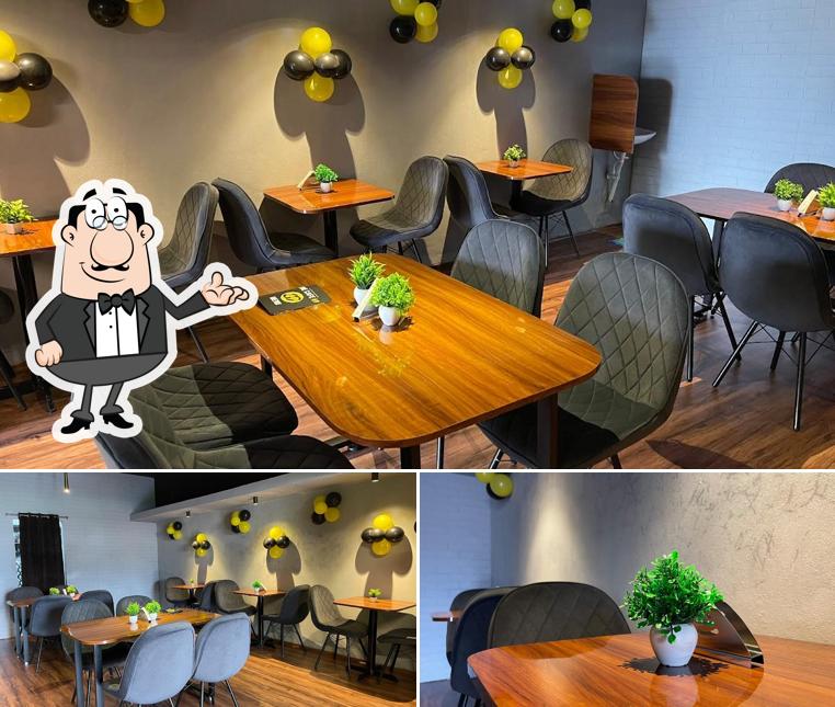 Take a seat at one of the tables at The Cafe 69