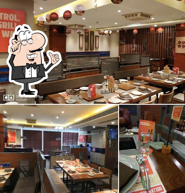 Take a seat at one of the tables at Barbeque Nation-Rajarhat