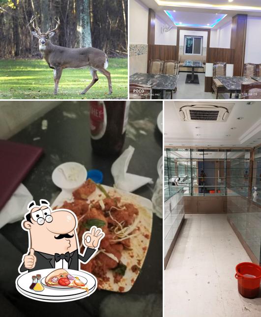 Pick pizza at Tirumal Bar and Restaurant