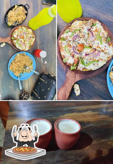 Get pizza at Sukoon Cafe